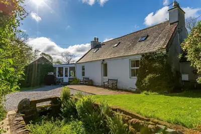 Image de La maison de Miller a un grand jardin dans un endroit très privé et isolé