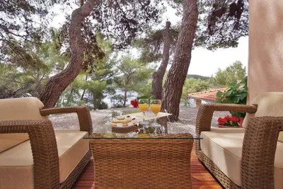 Image de Appartement en première ligne de mer avec salle de gym et barbecue