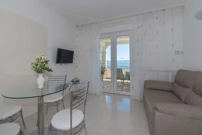 Image de Appartement de vacances avec vue sur la mer et possibilité de faire un barbecue
