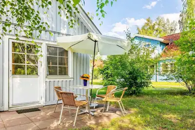 Image de Appartement sans obstacle Schwalbe, 4 pers. , Cheminée (1) - Feriendorf Müritzufer