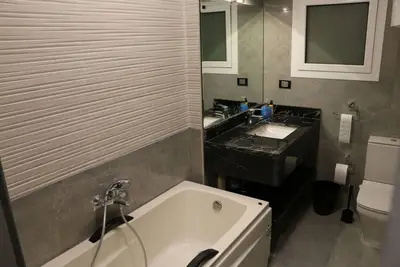 Image de Dnr Home Appartement prestigieux en Noir et Blanc avec accès facile