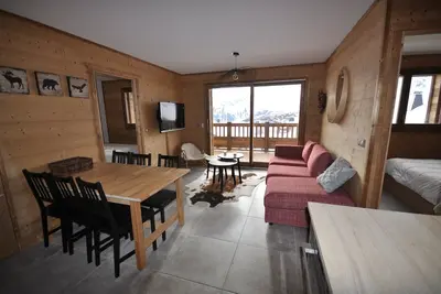 Image de Appartement neuf et chaleureux avec vue panoramique, accès direct sur les pistes
