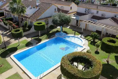 Image de Cabo Roig 1 lit Apt, vue sur la mer, piscine communautaire, amusement, nourriture et divertissement