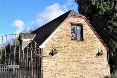 Image de Penybont Barn, une confortable conversion de grange au bord de la rivière à Llangorse, les Brecon Beacons