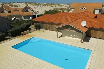 Image de Confortable appartement pour 4 personnes avec piscine, Wifi, Tv, terrasse, animaux admis et parking