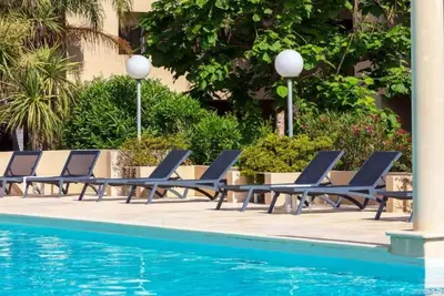 Image de Bel appartement avec internet, piscine, climatisation, Tv, balcon, animaux admis et parking