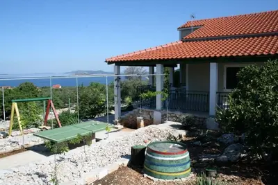 Image de Maison pour la famille avec parking Primosten (K-17979)