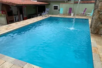Image de Maison Itanhaém à 200 mètres de la plage avec piscine