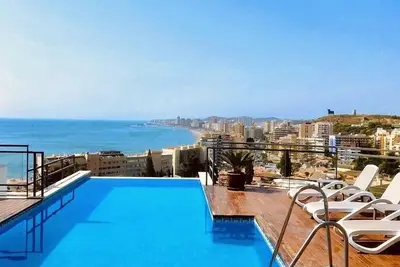 Image de Accueil sur le rocher - Vues spectaculaires \/ Piscine à débordement \/ WiFi \/ 5 minutes de la plage \/ Commerces \/ Bars.