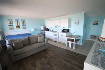 Image de Room #203 Efficiency King w/Kitchen Dog Y