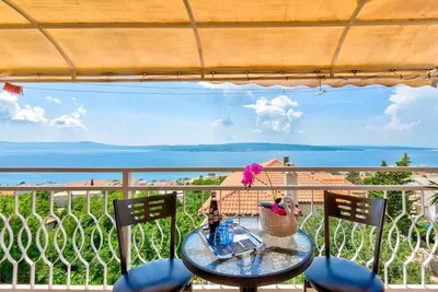 Image de Appartement de vacances avec balcon et vue sur la mer