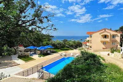 Image de Suite Confort 2 chambres 4 * avec piscine, plage et barbecue 1