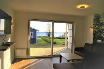 Image de Vacation home H (77 m²) with lake view for up to 4 people
