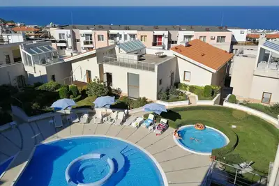Image de Cozy 2 bedroom 3 floor villa with huge terraces 450 m. from the beach