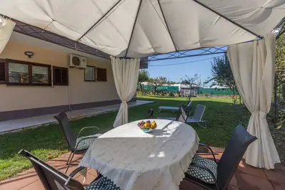 Image de Appartement spacieux avec 2 chambres, 2 salles de bain et jardin à 100m de la plage