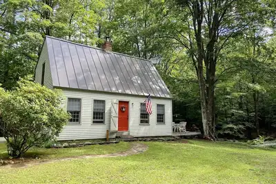 Image de Chalet confortable niché dans les bois