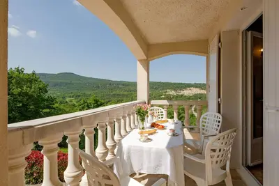 Image de Bel appartement dans une maison de vacances avec Wifi, Tv, balcon, vue panoramique, parking