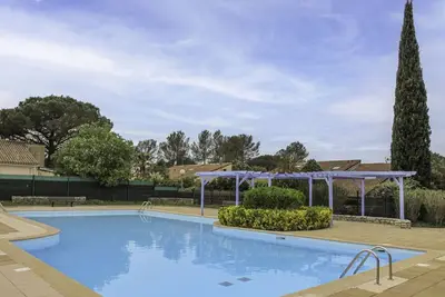Image de Appartement dans une maison de vacances avec Wifi, piscine, climatisation, Tv, terrasse, parking