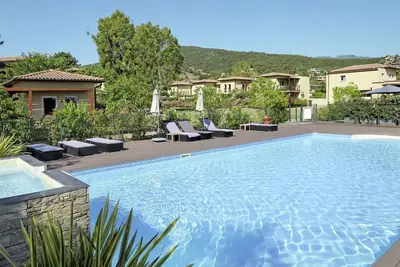 Image de Bel appartement avec Wifi, piscine, climatisation, Tv, terrasse, animaux admis et parking
