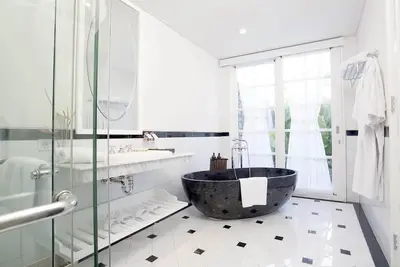 Image de Suite 1 chambre avec piscine