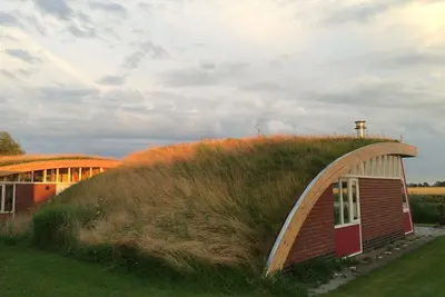 Image de Dormir sous un toit d'herbe sur le Reitdiep à Groningue