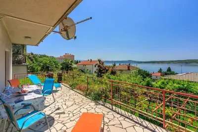 Image de Appartement de vacances avec climatisation et vue sur la mer