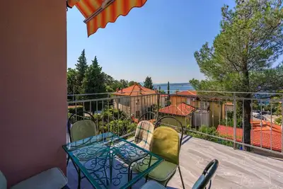 Image de Appartement de vacances avec climatisation et vue sur la mer