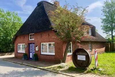 Image de Maison exclusive au toit de chaume près de Friedrichstadt.