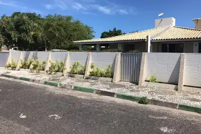 Image de Grande maison de jardin près de la plage