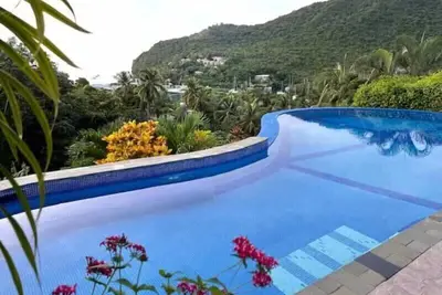 Image de Marcher jusqu'au village pittoresque de la baie de Marigot, plage à proximité, cuisinier 3x / semaine inclus, climatisation, wifi gratuit