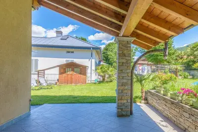 Image de Confortable appartement avec Wifi, bain à remous, Tv, terrasse, animaux admis et parking