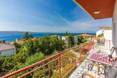 Image de Appartement de vacances avec climatisation et vue sur la mer