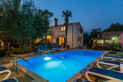 Image de Confortable appartement avec climatisation, Wifi, piscine, Tv, terrasse, animaux admis et parking