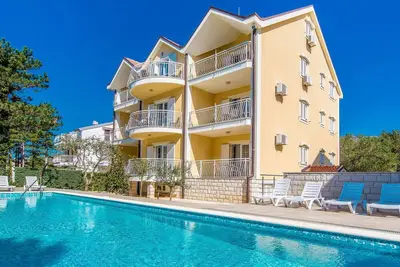 Image de Joli appartement pour 4 personnes avec climatisation, Wifi, piscine, Tv et patio