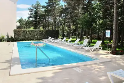 Image de Joli appartement pour 6 personnes avec piscine, climatisation, Wifi, Tv, patio et parking