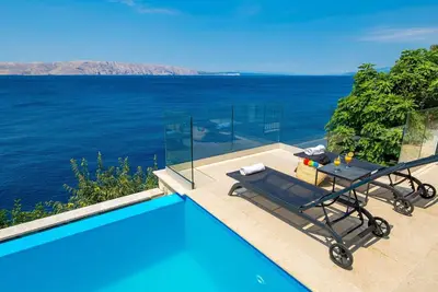 Image de Confortable appartement avec piscine, climatisation, Wifi, Tv, terrasse, animaux admis et parking