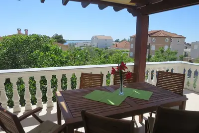 Image de Joli appartement pour 6 personnes avec climatisation, Wifi, Tv, terrasse, animaux admis et parking