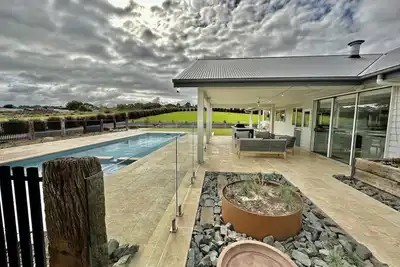 Image de Inlet Waters Escape - Spacieuse maison et propriété de 7 chambres. Maison 5br et 2 suites king
