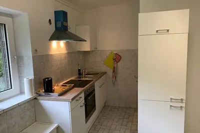 Image de Appartement \/ fitter récemment rénové au rez-de-chaussée avec terrasse dans un emplacement central