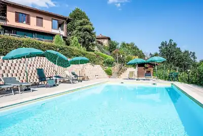 Image de Joli appartement dans une maison de vacances avec Wifi, piscine, Tv, patio, animaux admis et parking