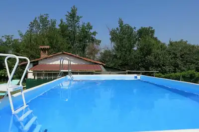 Image de Joli appartement dans une maison de vacances avec piscine, Wifi, Tv, patio, animaux admis et parking