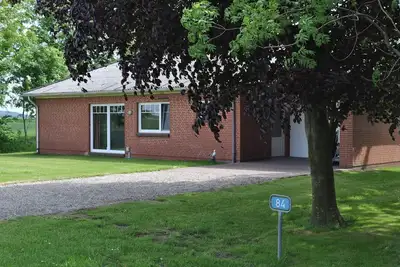 Image de maison de vacances de luxe avec jacuzzi et sauna, sur la mer du Nord, animaux domestiques admis