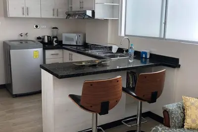 Image de Emplacement et confort de la suite à Quito Wi-Fi haut débit