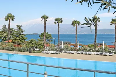 Image de Joli appartement avec climatisation, Wifi, piscine, Tv, terrasse, animaux admis et parking