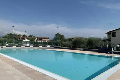 Image de Confortable appartement avec piscine, Wifi, climatisation, Tv, terrasse, animaux admis et parking