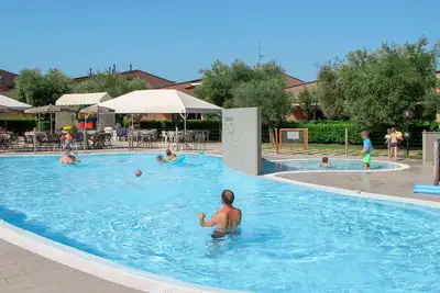 Image de Joli appartement avec climatisation, piscine, Wifi, Tv, balcon, animaux admis et parking