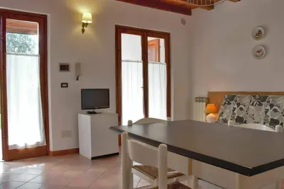 Image de Joli appartement pour 4 personnes avec piscine, Wifi, Tv, patio, animaux admis et parking