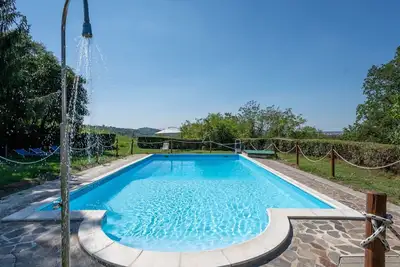 Image de Joli appartement dans une maison de vacances avec Wifi, piscine, terrasse, animaux admis et parking