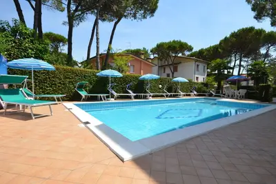 Image de Agréable appartement avec piscine, climatisation, Wifi, Tv, terrasse, animaux admis et parking