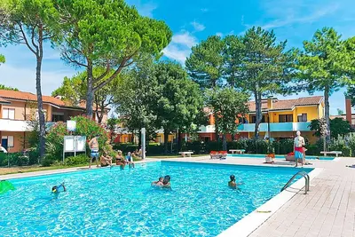 Image de Joli appartement pour 5 personnes avec Wifi, piscine, climatisation, Tv, terrasse et animaux admis